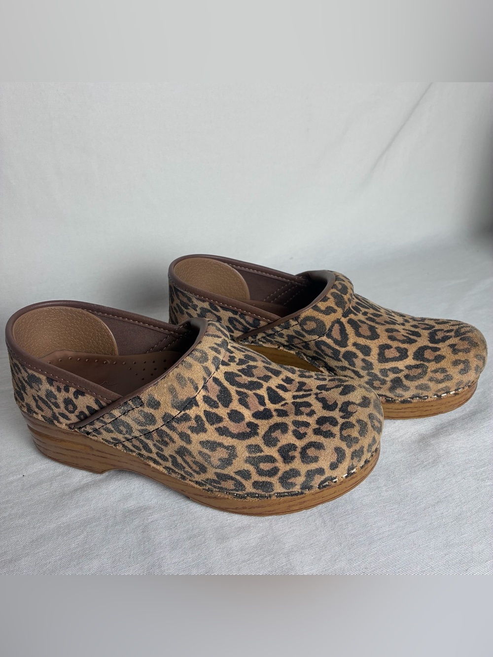 Dansko Leopard Print Clogs in Brown and Black
